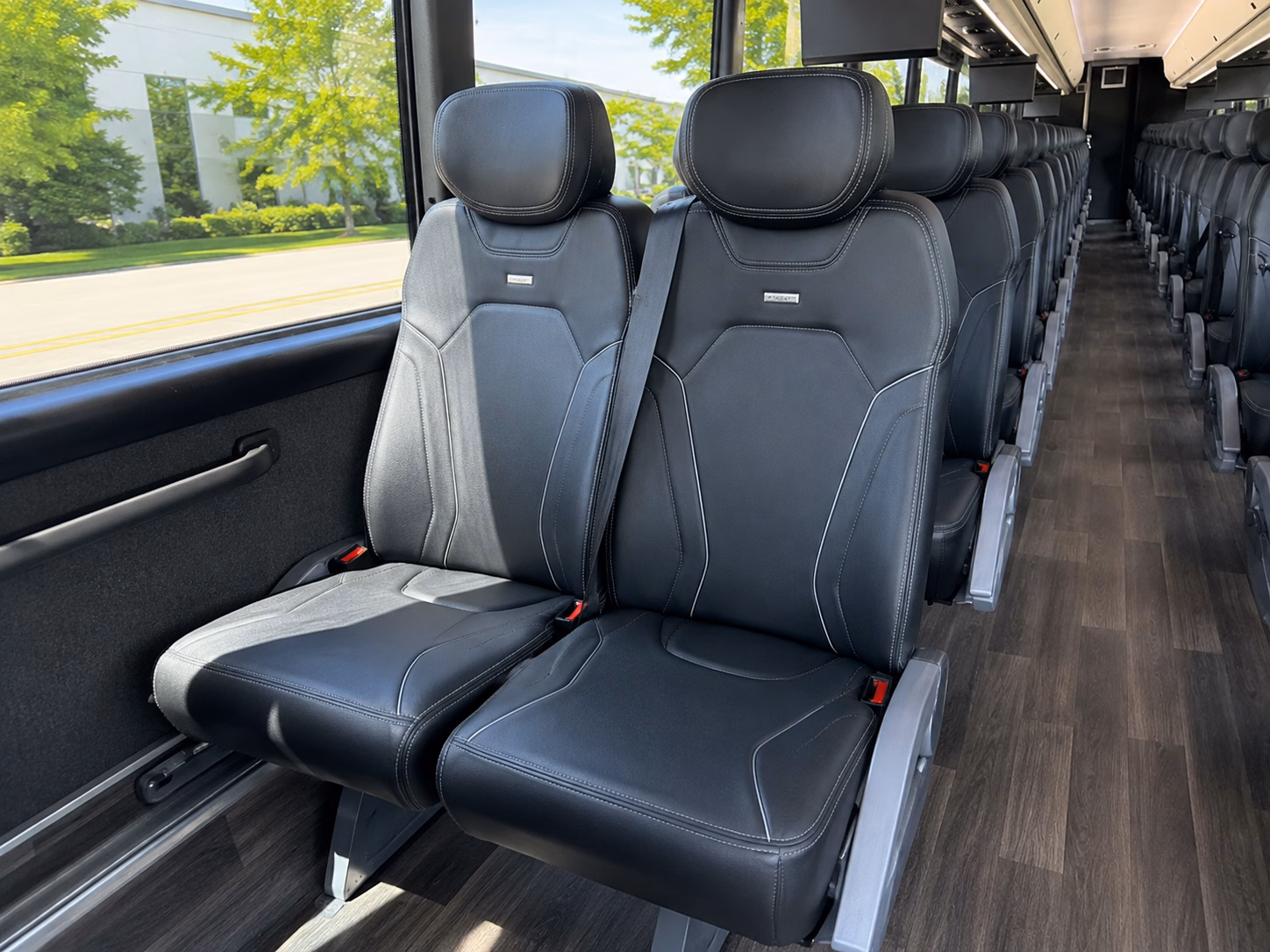 how your starting location and deadhead miles affect charter bus rates in clinton michigan